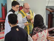 Padre Jean Marcos no apostolado externo em São Lourenço (MG)