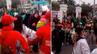 Grupos feministas atacam ativistas pró-vida que rezavam em frente a clínica de aborto em Bogotá, Colômbia.