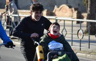 José Manuel Roas e seu filho durante uma corrida.